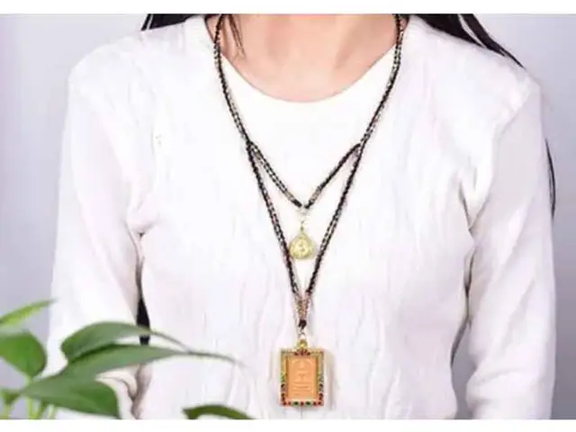 Máy Niệm Phật Đeo Cổ Là Gì?