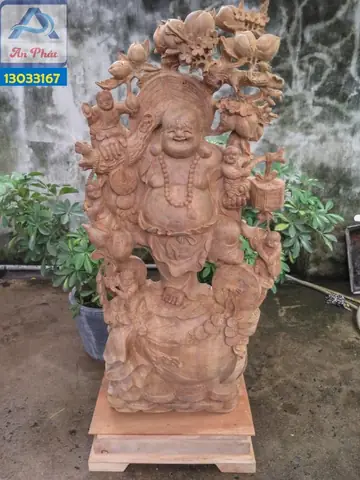 Tác Phẩm Phật Di Lặc Xá Xị Ngồi Gốc Đào- Phật Di Lặc Ngồi Gốc Đào Với Tự Thế Tự Tại, Cửu Phúc Vậy Xung Quanh Mang Ý Nghĩa Sự Trường Thọ Vĩnh Viễn, Từ Cửu Trong Từ Vĩnh Cữu Trường Tồn Theo Thời Gian. Tượng Cao 1m30 Rộng 1m25 Sâu 45cm, Chế Tác Trên Nền Chất Gỗ Xá Xị Nguyên Gốc, Đường Nét Tự Nhiên Tạo Nên Khác Biệt Của Tượng Phật.